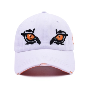 White washed baseball cap with embroidered tiger eyes and distressed brim details