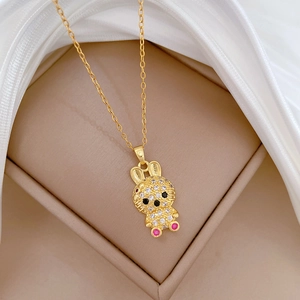 Elegant gold rabbit necklace with pavé zircons in a premium jewelry gift box