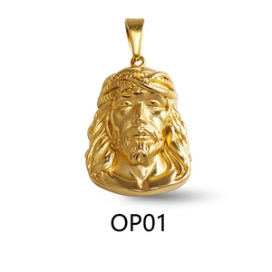 Detailed close-up of a gold Jesus head pendant with crystals and polished metal finish