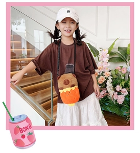 Child wearing Capybara plush crossbody bag featuring brown and orange soft fur detail