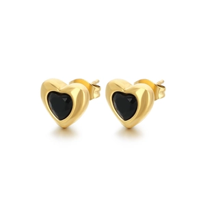 Minimalist gold heart stud earrings with black center stone on a clean white background