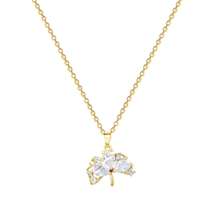 Elegant gold hollow ginkgo leaf necklace with sparkling rhinestones on white background