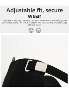 Detail of adjustable metal buckle and fabric strap on black baseball cap for custom fit