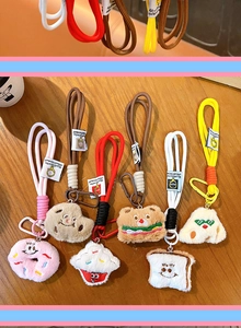 Cute plush food keychain detail, soft stuffed pendant for backpack and car keys.