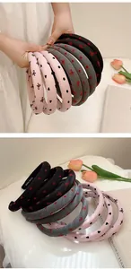 Close-up of thick sponge headbands with heart, bow, and polka dot knit patterns