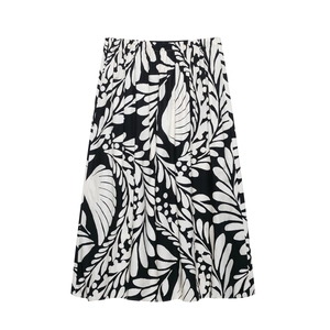 Jupe midi élégante à taille haute avec imprimé de feuilles botaniques noir et blanc chic