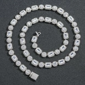 Detailed view of tennis necklace with silver base and sparkling cubic zirconia stones