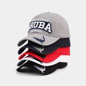 Vertical stack of five embroidered cotton golf caps in grey navy red white and black