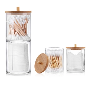 Acrylic makeup organizer set with bamboo lids for cotton swabs and pads on white background