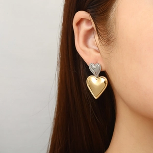 Two-tone gold and silver layered heart drop earrings in polished titanium steel