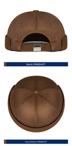 Detailed view of brown mesh brimless docker hat showing metal buckle and top texture