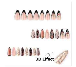 Detailed set of 3D almond press-on nails featuring cherry, zebra print and textured designs
