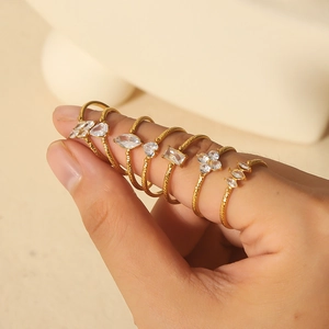 Close-up of 18K gold plated stainless steel rings with sparkling cubic zirconia