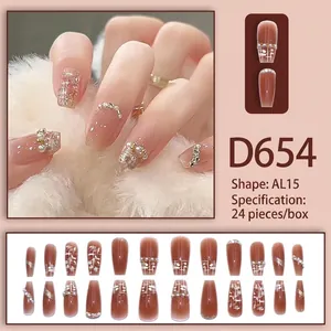 Coffin press-on nails in blush pink with pearls, white plaid designs and glossy finish