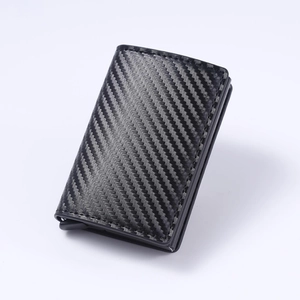 Slim RFID carbon fiber card wallet with automatic pop-up mechanism and metallic frame