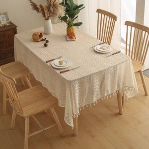 Beige lace tablecloth with snowflake patterns and tassel edges for Christmas party