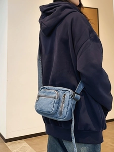 Vintage blue washed denim crossbody bag with multiple zip pockets for men and women