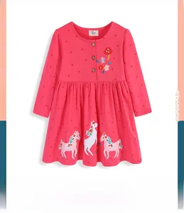 Detailed embroidery of flowers and mushrooms with wood buttons on pink girl's dress