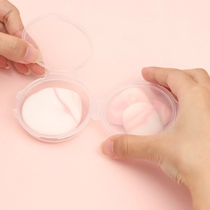 Mini thumb powder puff set in clear storage cases for precise makeup application