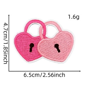 Detail view of interlocking pink embroidered heart patches with size and weight dimensions