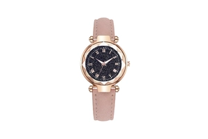 Detail of rose gold starry sky dial with roman numerals and faceted crystal glass