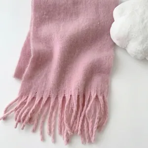 Thick pink mohair scarf with tassels for women, warm winter knit with soft texture