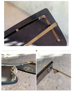 Detailed view of silver metal hinges, silicone nose pads and gray polarized lenses