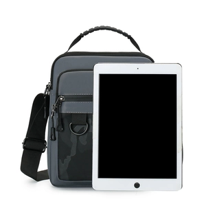 Men's grey camo shoulder bag shown with a tablet to demonstrate large storage capacity