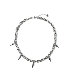 Titanium steel tassel rivet necklace with silver conical pendants on white background