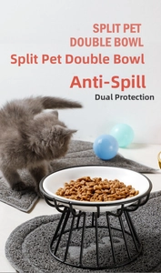 Split ceramic cat food bowl with elevated black metal stand and minimalist pet feeding setup