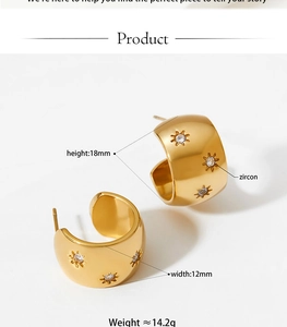 Detail shot of gold-plated C-shape hoop earrings with star-set zircon, 18mm height