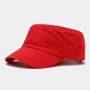 Detail view of red flat top military cap with fine stitching on the cotton brim