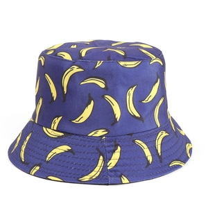 Navy blue reversible bucket hat with yellow banana print for summer outdoor sun protection