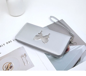 Silver long wallet featuring a metallic butterfly buckle and secure wrist strap