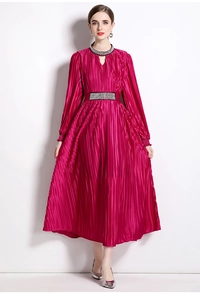 Detail of the beaded collar and sparkling waistband on this elegant magenta pleated dress