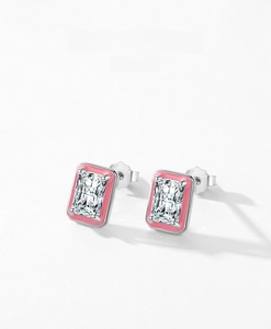 Detail of S925 silver stud earrings with pink enamel and step-cut zircon stones