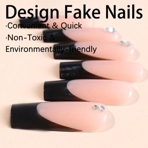 Long coffin fake nails with black French tips, pink gradient and rhinestone accents