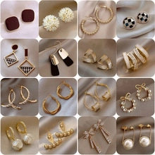 Collection of 16 pairs of Korean-style petite stud earrings with pearls and crystals