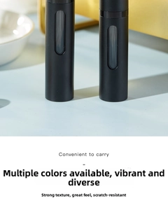 Close-up of 5ml portable perfume atomizer with viewing window in matte black finish