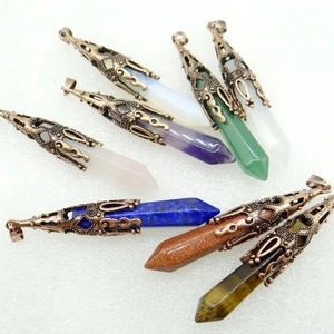 Vintage hexagonal crystal bullet pendants with bronze metal caps in various natural stones