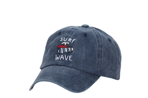 Detail of SURF WAVE embroidery and surfboard graphic on navy washed cotton baseball cap