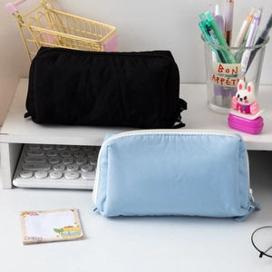 Minimalist large capacity nylon mesh pencil cases in black and sky blue colors