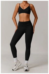 Macro view of tight elastic fabric texture and seamless stitching on black yoga set