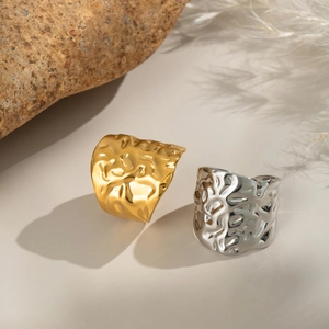 Polished stainless steel rings with geometric hammered texture in gold and silver finish