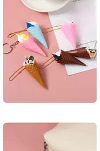 Detailed view of colorful mini resin ice cream cone keychains with gold bead chains
