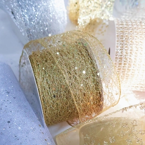 Sparkling metallic glitter mesh ribbons in gold and silver for festive gift wrapping