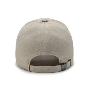 Modern light khaki baseball cap with adjustable metal strap buckle on clean background