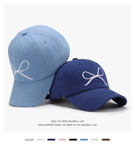 Detail of baseball cap with bow embroidery and 2024 collection color palette overview