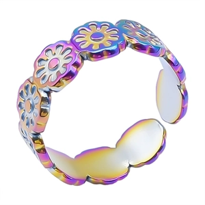 Detailed view of iridescent stainless steel daisy flower ring with adjustable open band