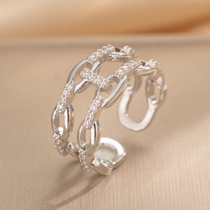 Double-layered chain link open ring with micro-pave zircons on a silky surface
